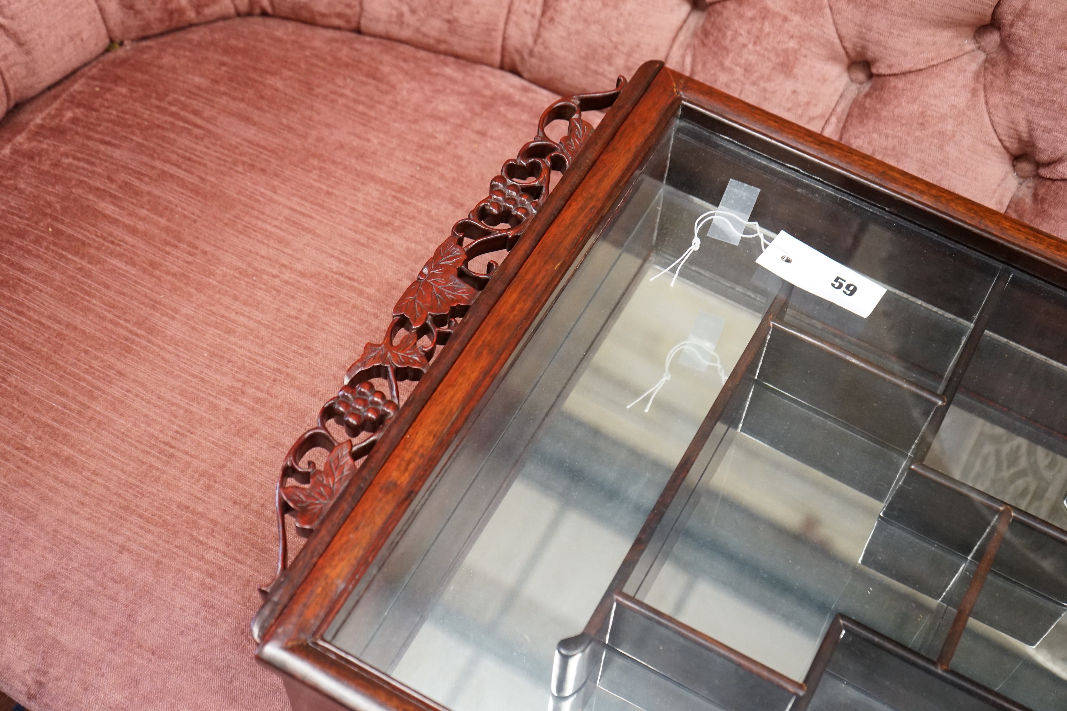 A Chinese glazed hardwood wall display cabinet, width 45cm, height 74cm